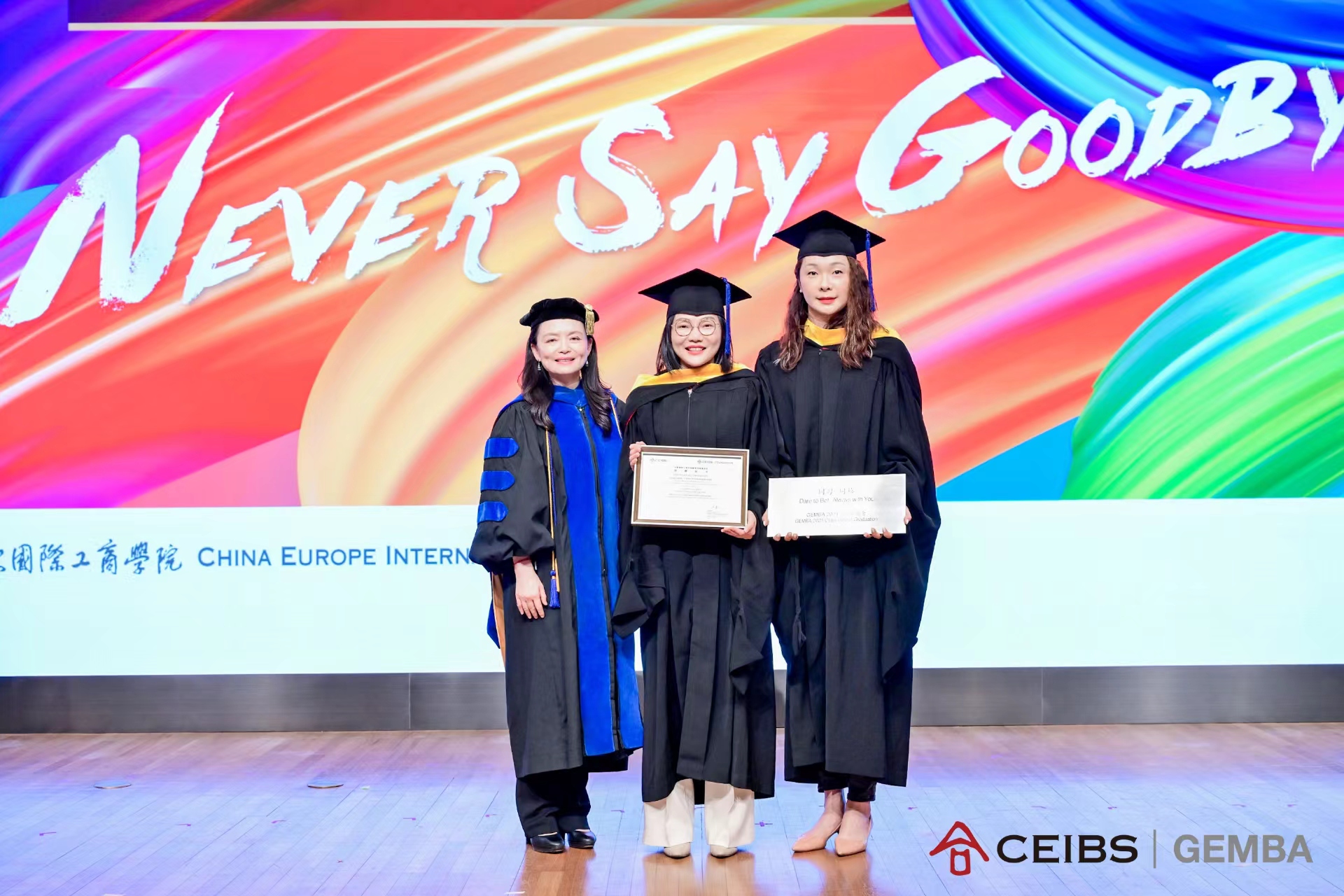 Professor Katherine Xin presents certificates for class gift donations