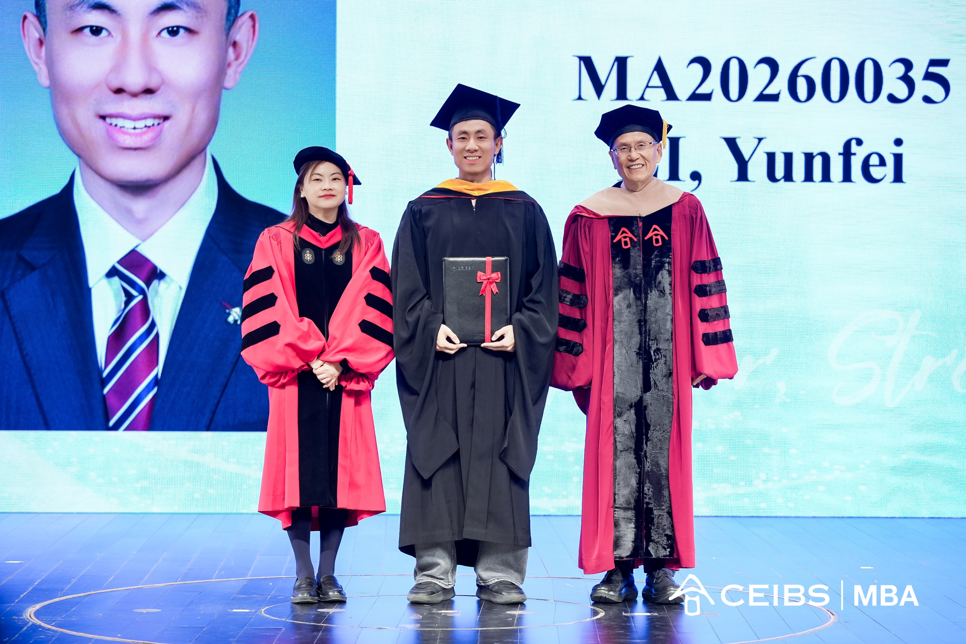 Professors present graduation certificates to graduates