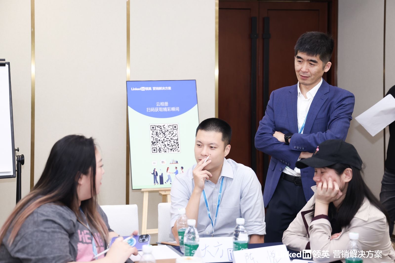 Travis with 3 colleagues