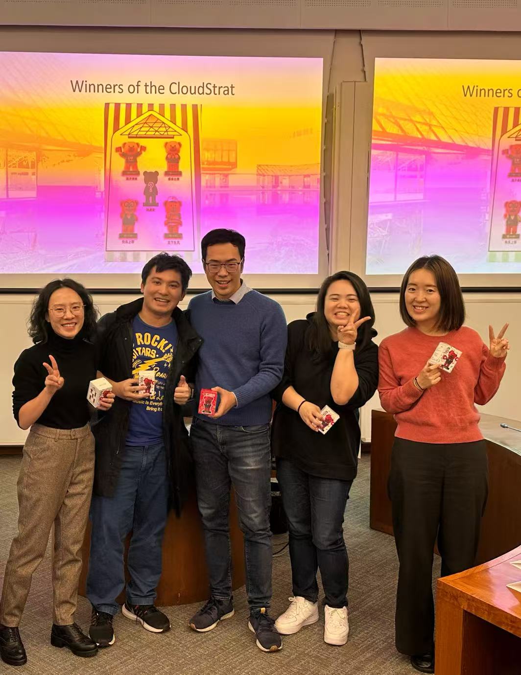A group photo of Mengqi, Jack, and other Term 1 team members from their data class, where the team won first place in the challenge